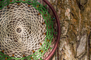 Handmade dream catcher with feathers threads and beads rope hanging