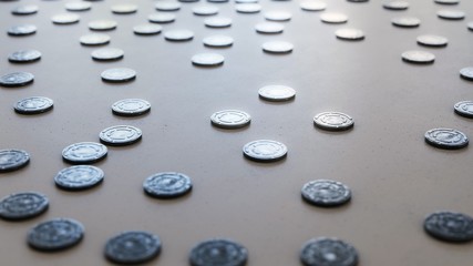steel Film Reel Cans scattered on a white surface with shallow depth of field