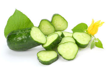 cucumber with sliced cucumber and leaf isolated on white background