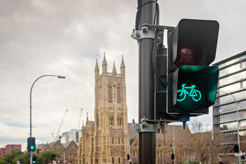 Green traffic light signal for bicycle to pass intersection in South Australia