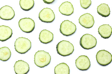 sliced cucumber isolated on a white background top view