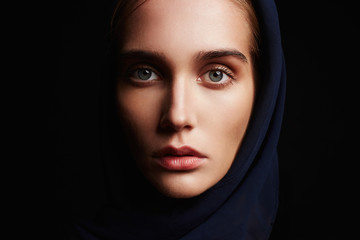 religious young woman.beauty girl in hood