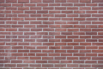 Fototapeta premium Rotbraune Ziegelsteinwand - Klinkersteinwand