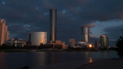Fototapeta na wymiar Sunrise on waterfront, Yekaterinburg City, Russia