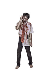 Portrait of creepy asian zombie man in clothes with blood