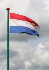 Dutch flag waving with background cloudy sky
