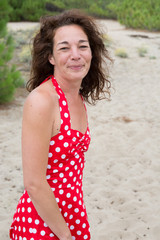 Beautiful woman in ocean beach background happy summer person