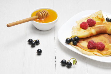 Pancake - Crepes with berries and honey