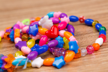bead bracelet with beautiful handcrafted wooden background