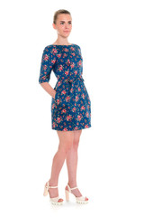 Happy lady makes romantic moves. Full body portrait of young lady in casual dress, expressing joy on white background