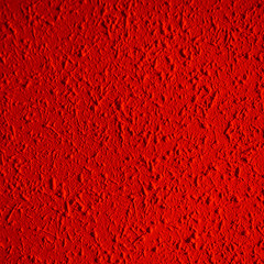 Closeup of red color grunge textured wall with  vignetting, may use as background with copy space for text.