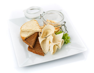Snack for beer. Crackers and pita bread with sauce.