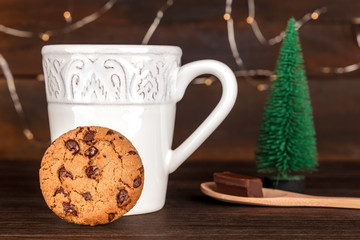 Chocolate chips cookie, cup of hot chocolate, Christmas tree