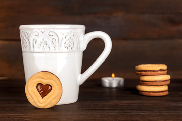 Cookies, hot chocolate, candle, and place for text