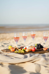 Refreshing  Rosa Wine in a Glass . Beach Cheers Celebration Friendship Summer Fun Dinner Concept.