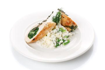 Restaurant food. Delicious lunch. Rice with meat on a plate.