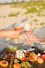 Refreshing  Rosa Wine in a Glass . Beach Cheers Celebration Friendship Summer Fun Dinner Concept.