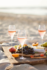 Refreshing  Rosa Wine in a Glass . Beach Cheers Celebration Friendship Summer Fun Dinner Concept.