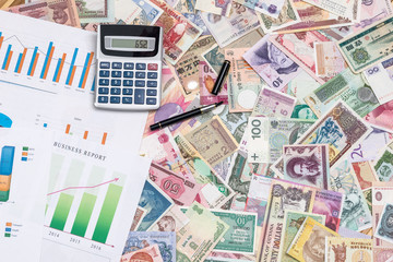 business graph with world paper currency