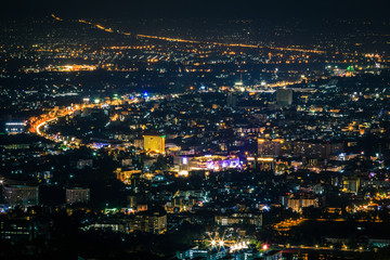 Night city scape at top view point of Chiang Mai, Thailand.