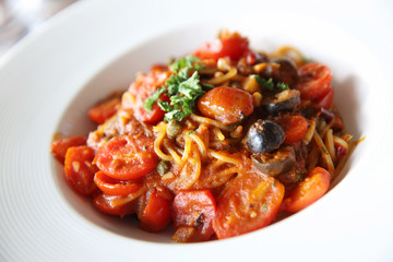 Spaghetti witn tomato and olive , Italian food