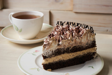 Chocolate cake and cup of tea