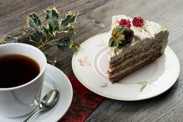 Sliced white Christmas cake with whipped cream