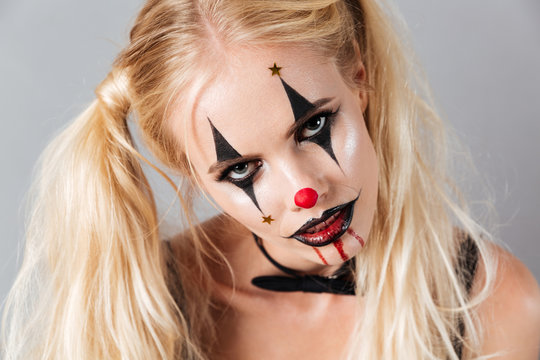 Close-up portrait of mystery blonde woman in halloween make up