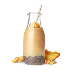 Bottle of delicious smoothie with chia seeds and peaches, isolated on white