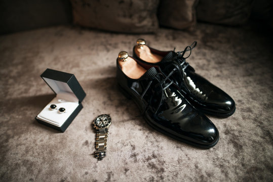 Wedding shoes, watch and cufflinks. Wedding accessories for the groom. Groom clothes.