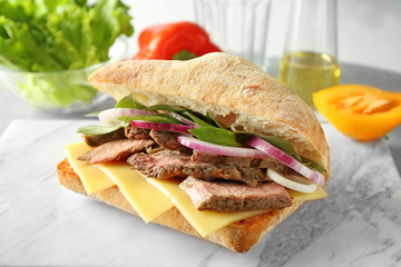 Steak sandwich on stone board