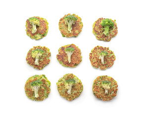 Delicious broccoli pancakes on white background