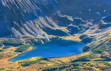 Blue lake in the crater of an extinct volcano in Kamchatka.