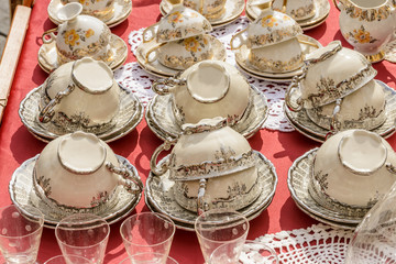 glittering parade of coffee cups on sale at street market, Chiavari , Italy