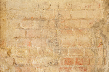 old brick wall old texture of beige stone blocks closeup