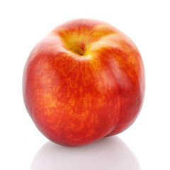 Beautiful ripe peach isolated on white background