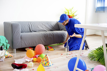 Janitor cleaning a mess