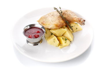 Delicious lunch. Potatoes with chicken and sauce