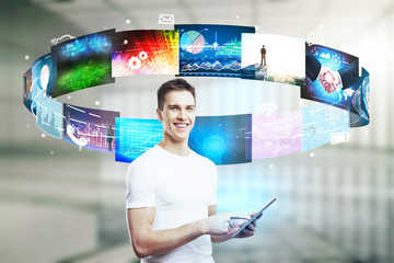 Man using tablet with media interface