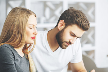 Fototapeta premium Cheerful european man and woman