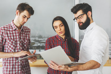 Caucasian people using laptop