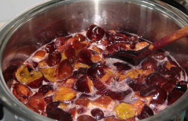 cooking plums  - preparing jam as preserve               