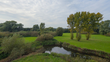 Water ways in a park in the countryside in late September, late afternoon in England