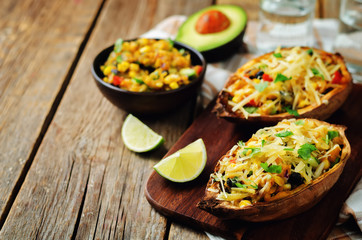 Black bean avocado corn stuffed sweet potatoes