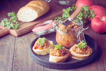 Bread toasts with eggplant caviar.
