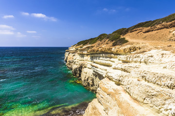 Fototapeta na wymiar Steep cliffs on the coast