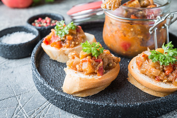 Bread toasts with eggplant caviar.