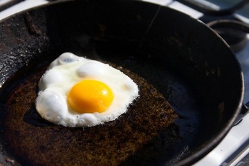 fried egg, one egg, a huge yolk,