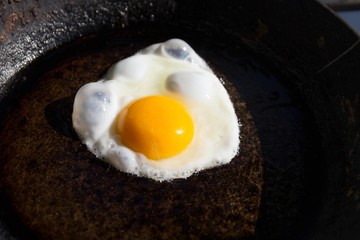 fried egg, one egg, a huge yolk,