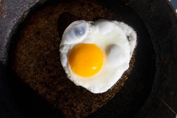 fried egg, one egg, a huge yolk,